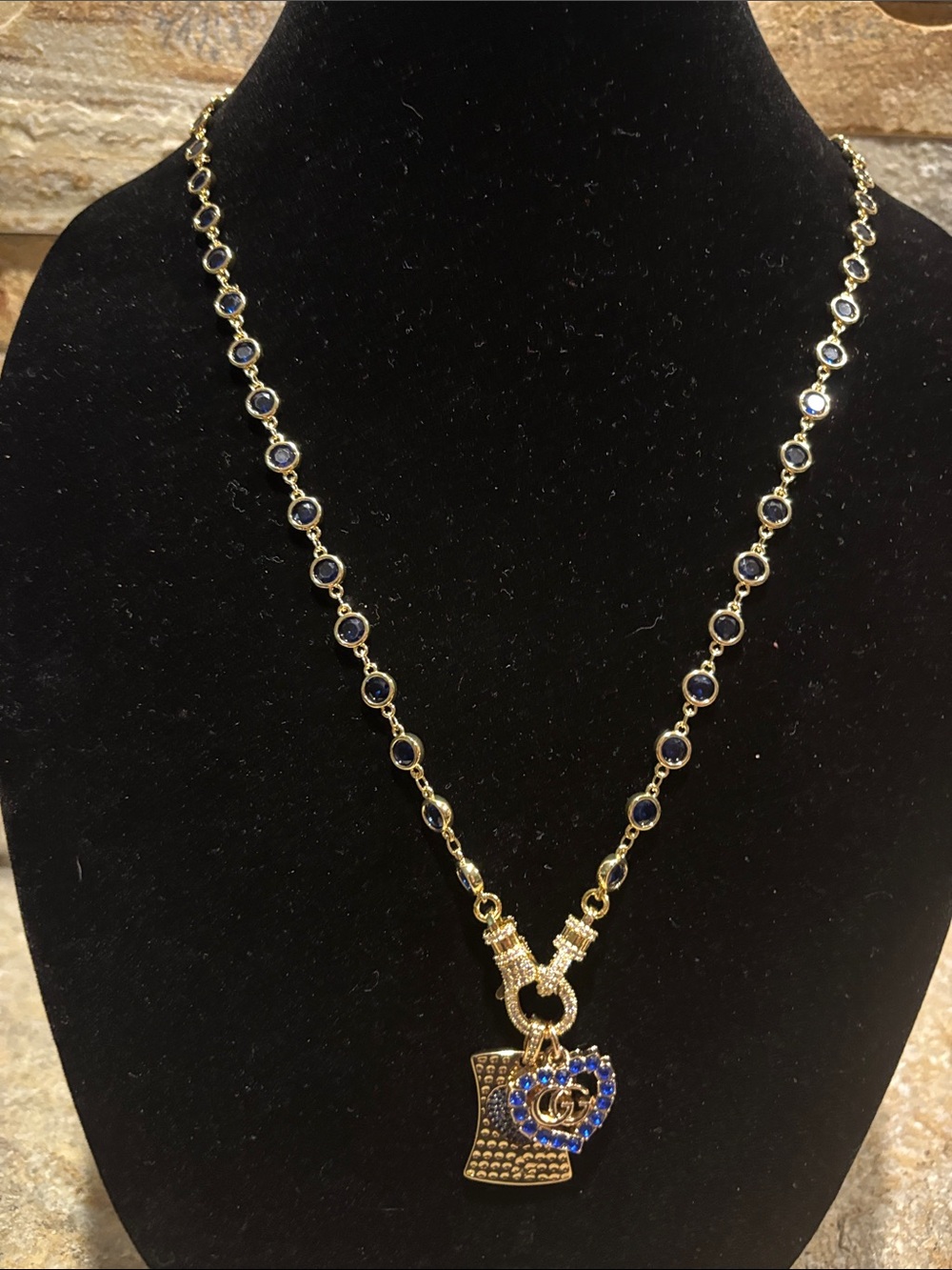 Gold-Tone Necklace with Blue Crystal Accents and a GG Heart Pendant